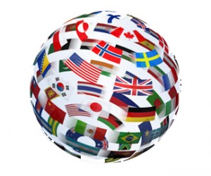 A Graphic depicting the global economy in the form of a sphere with flags of each country in 3 D
