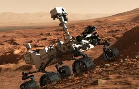 Mars Rover Curiosity exploring the rocky surface of Mars.